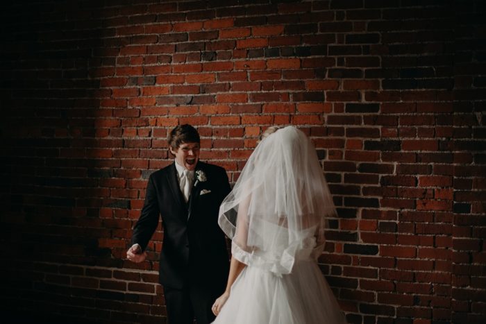 First Look Wedding Photos: White & Gray Industrial Wedding at the History Center from Rachel Rowland Photography featured on Burgh Brides