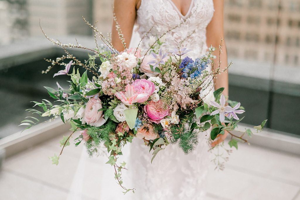 Floral Filled Energy Innovation Center Microwedding. For more small wedding ideas, visit burghbrides.com!