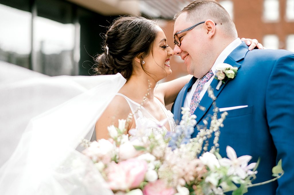 Floral Filled Energy Innovation Center Microwedding. For more small wedding ideas, visit burghbrides.com!