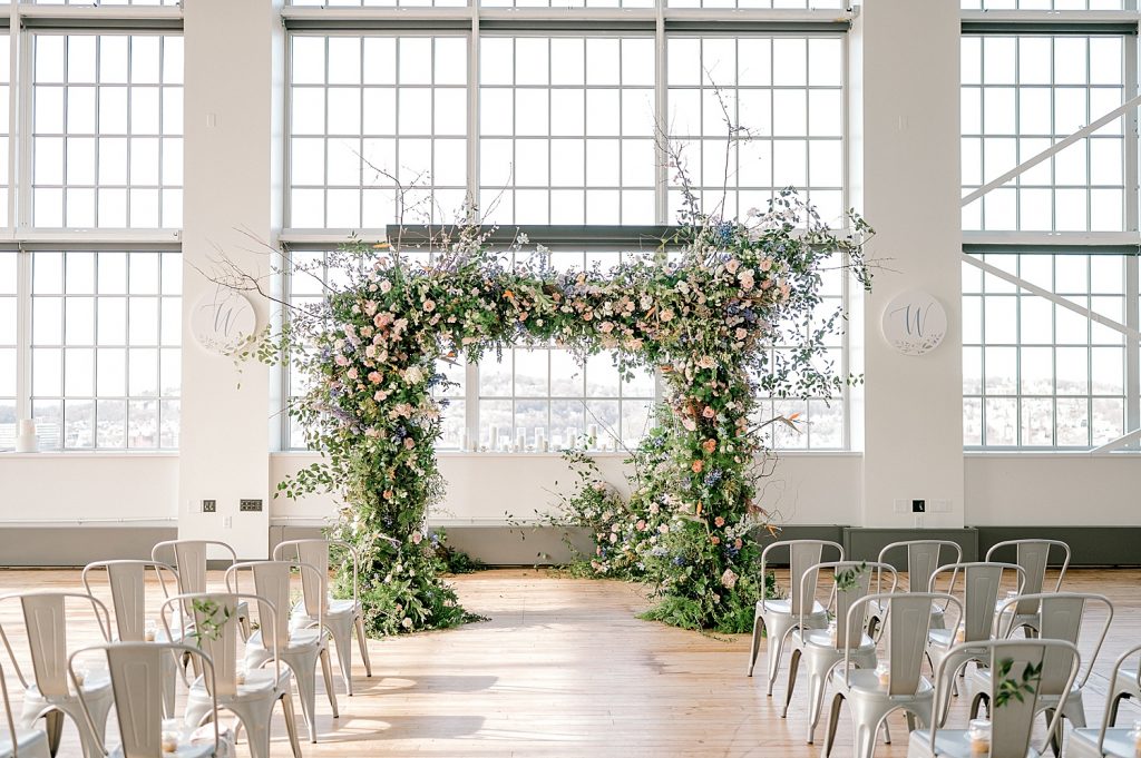 Floral Filled Energy Innovation Center Microwedding. For more small wedding ideas, visit burghbrides.com!