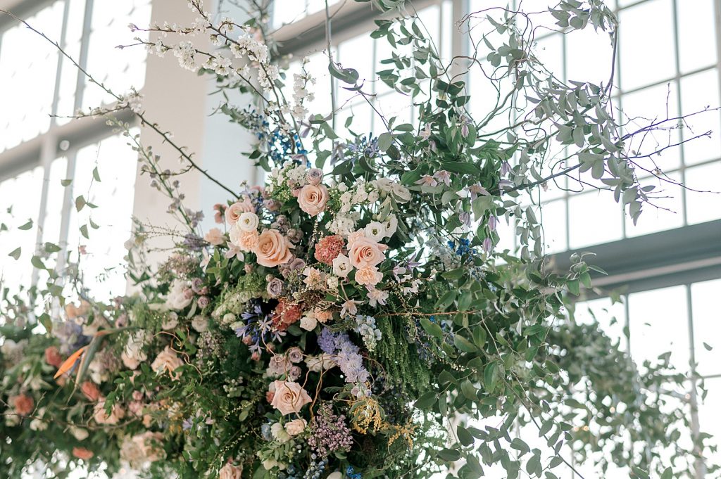 Floral Filled Energy Innovation Center Microwedding. For more small wedding ideas, visit burghbrides.com!