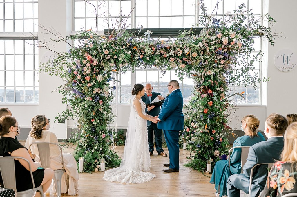 Floral Filled Energy Innovation Center Microwedding. For more small wedding ideas, visit burghbrides.com!
