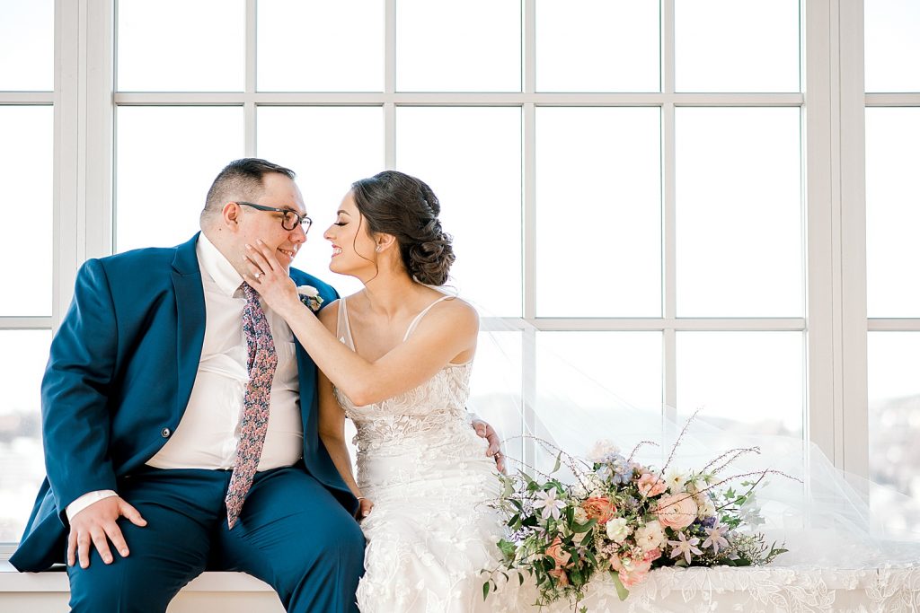 Floral Filled Energy Innovation Center Microwedding. For more small wedding ideas, visit burghbrides.com!