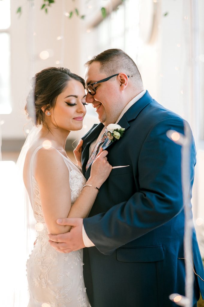 Floral Filled Energy Innovation Center Microwedding. For more small wedding ideas, visit burghbrides.com!