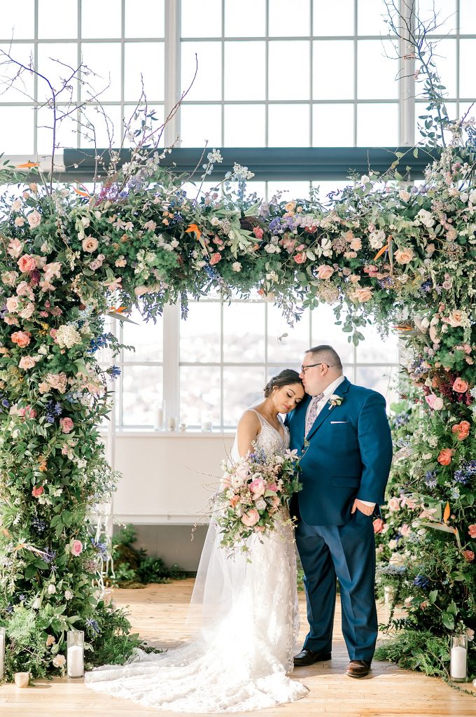 Floral Filled Energy Innovation Center Microwedding. For more small wedding ideas, visit burghbrides.com!