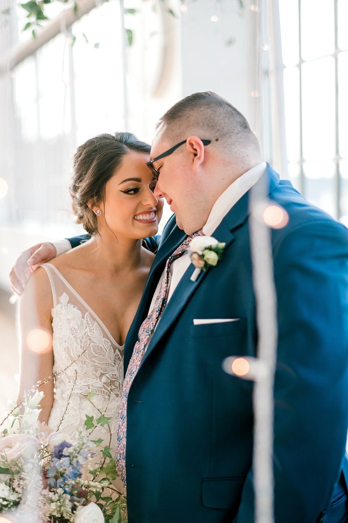 Floral Filled Energy Innovation Center Microwedding. For more small wedding ideas, visit burghbrides.com!
