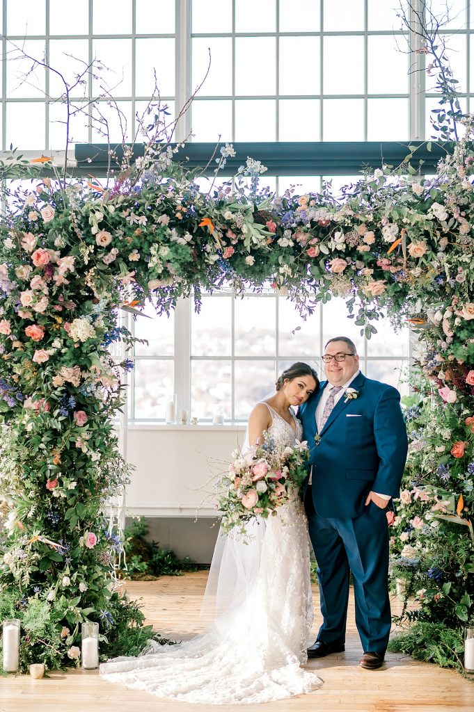 Floral Filled Energy Innovation Center Microwedding. For more small wedding ideas, visit burghbrides.com!