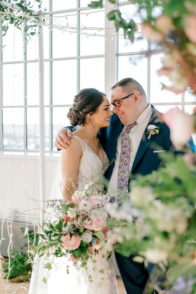 Floral Filled Energy Innovation Center Microwedding. For more small wedding ideas, visit burghbrides.com!