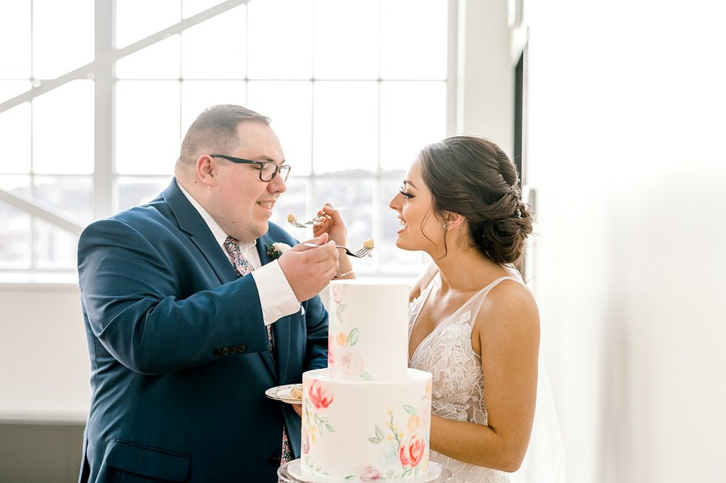 Floral Filled Energy Innovation Center Microwedding. For more small wedding ideas, visit burghbrides.com!